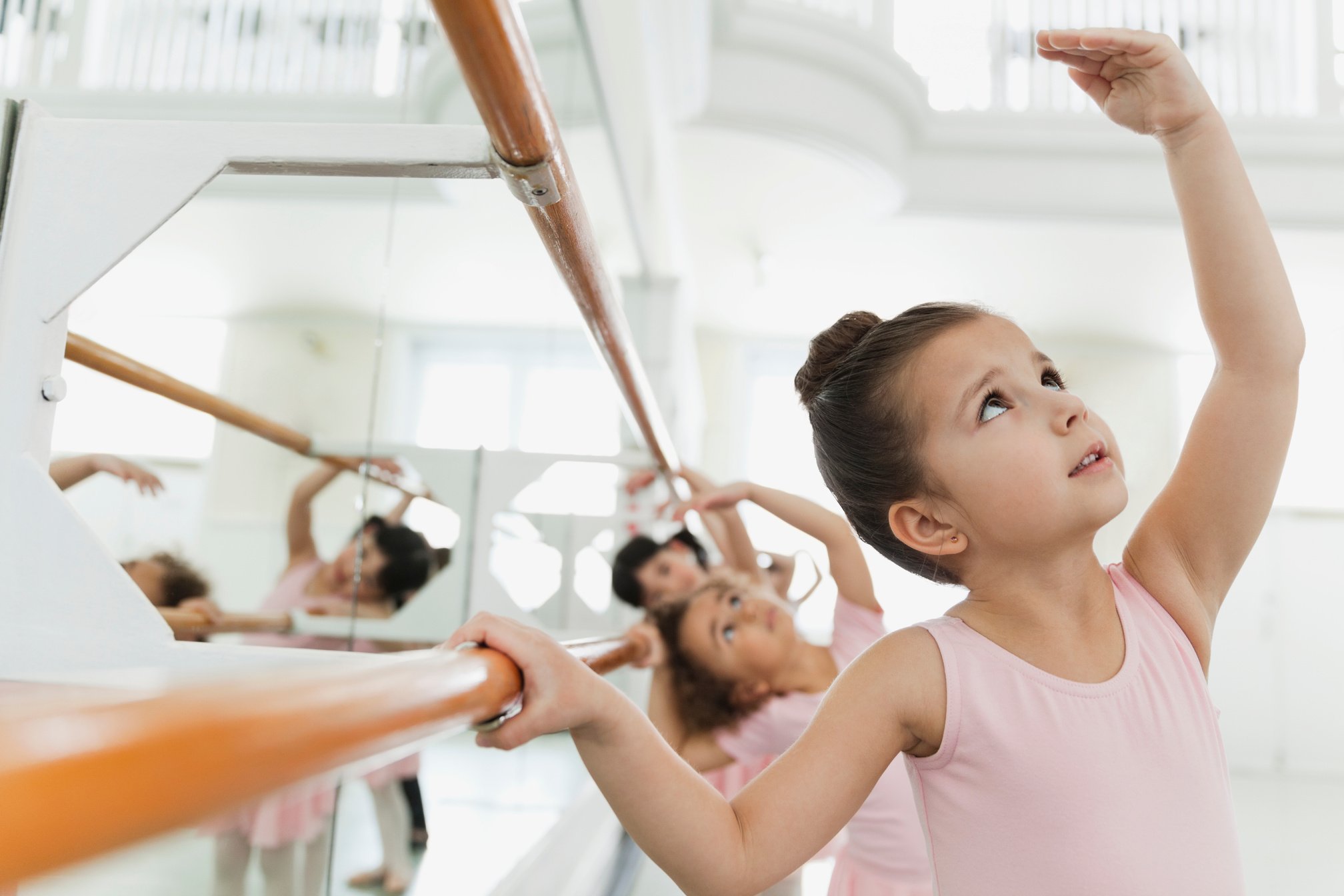 Children Practicing Ballet Poses in Ballet Studio