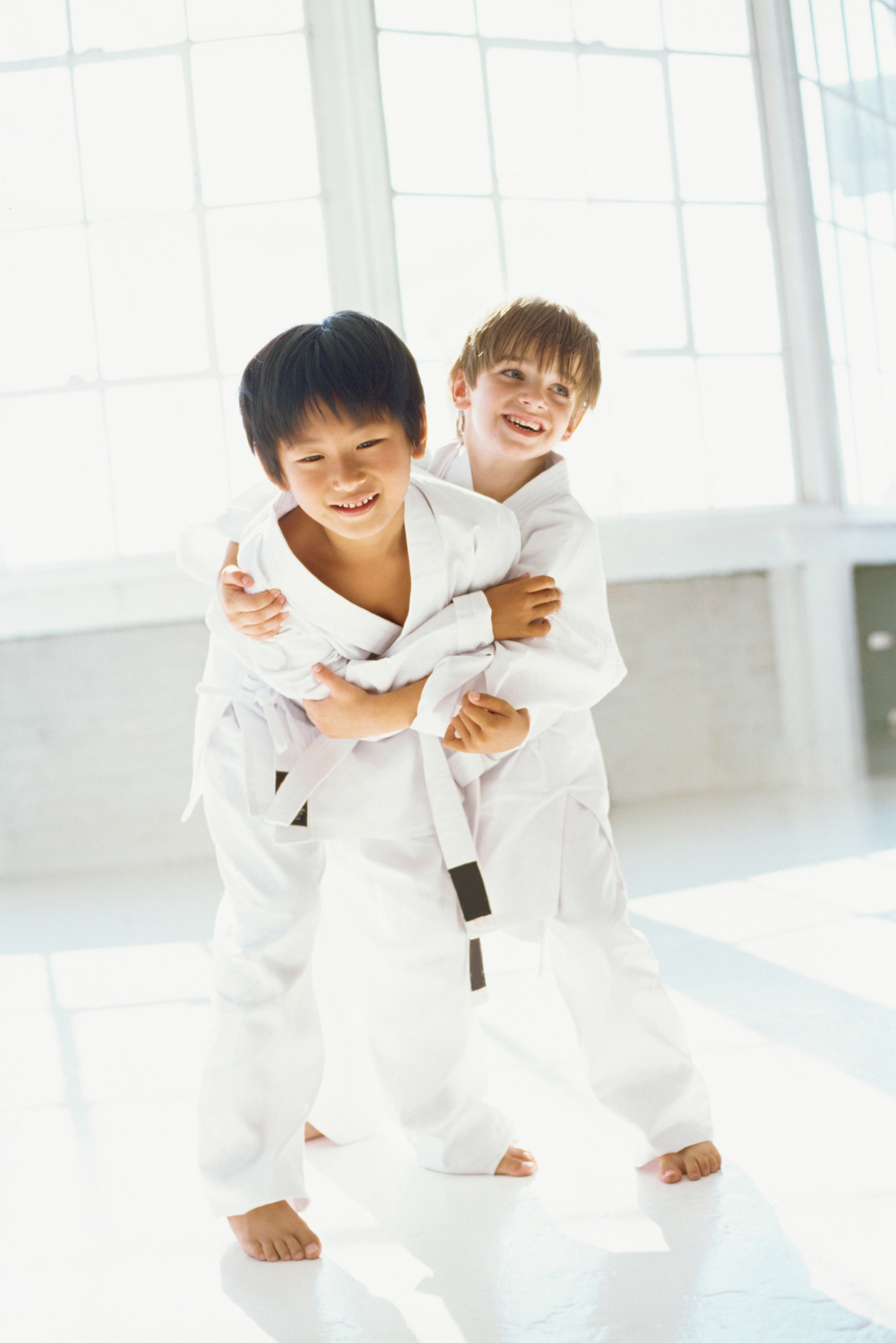 two boys practicing judo